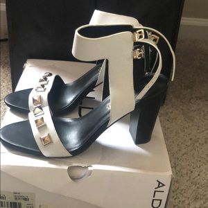 A L D O white sandals with gold studs